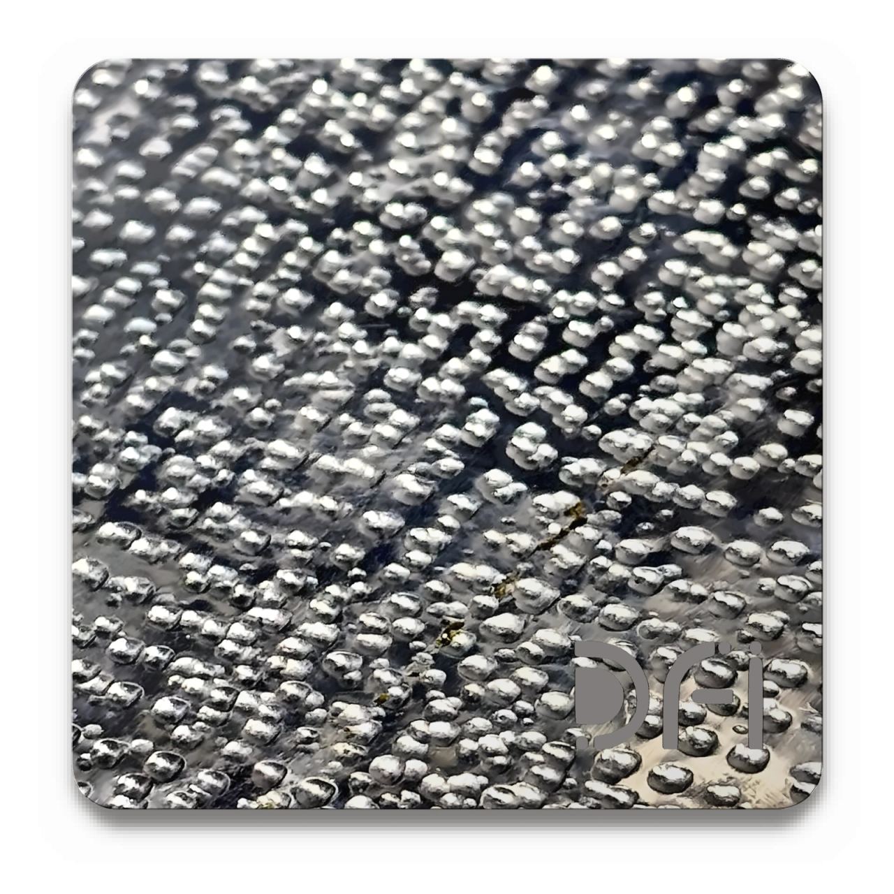 Dotted texture on blackened metal, Etched finish: a DFI sample plate with the DFI mark laser-cut in the corner